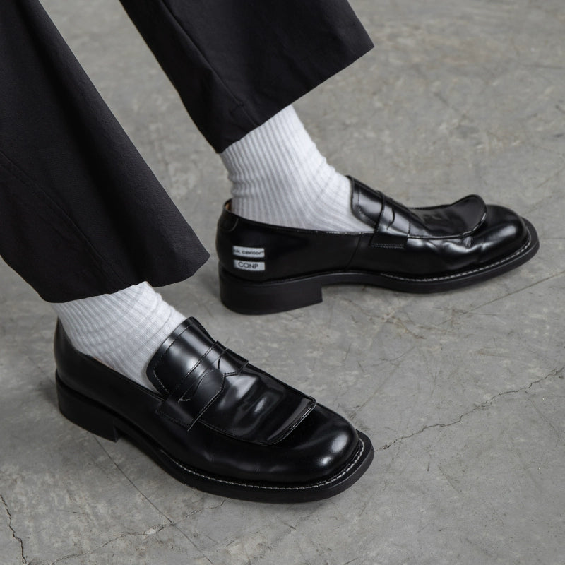 Noir Crest Loafers